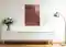 Wohnraum an dessen Wand über einem Tresen ein Bild mit dem Grundriss vom Kölner Dom hängt.